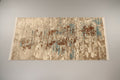 Textured rug on a wooden floor
