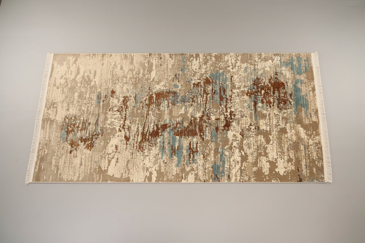 Textured rug on a wooden floor